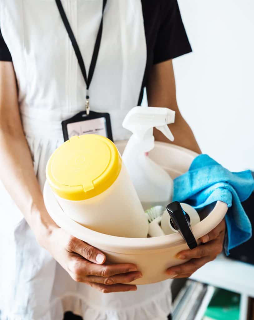 Cleaner holding cleaning supplies
